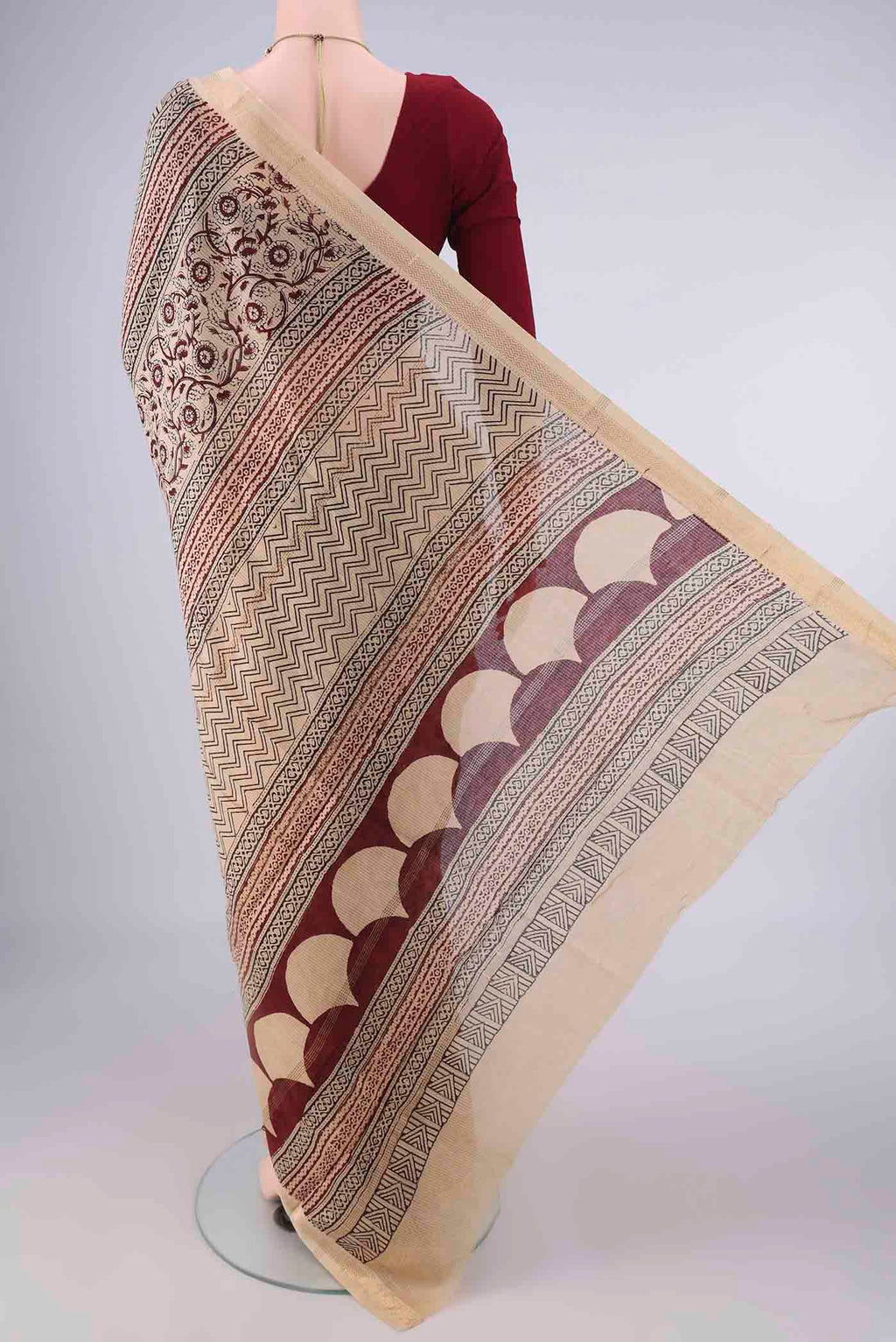 Flat view of Beige Maheshwari Cotton Saree with Printed design on the body and Zari Border. 