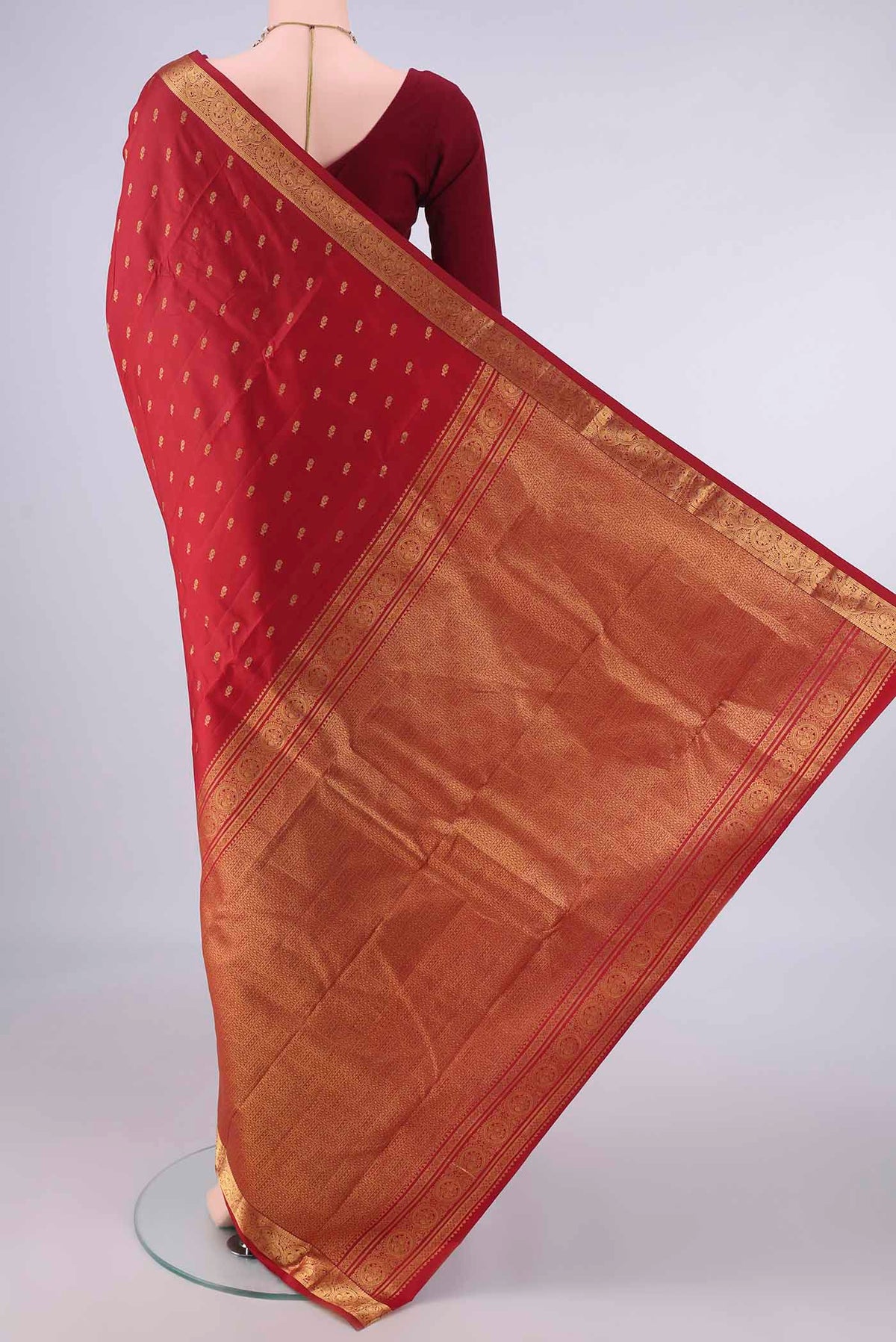 Flat view of Pure Silk Red Kanchipuram Saree with Zari Butta on the body and Zari Border. 