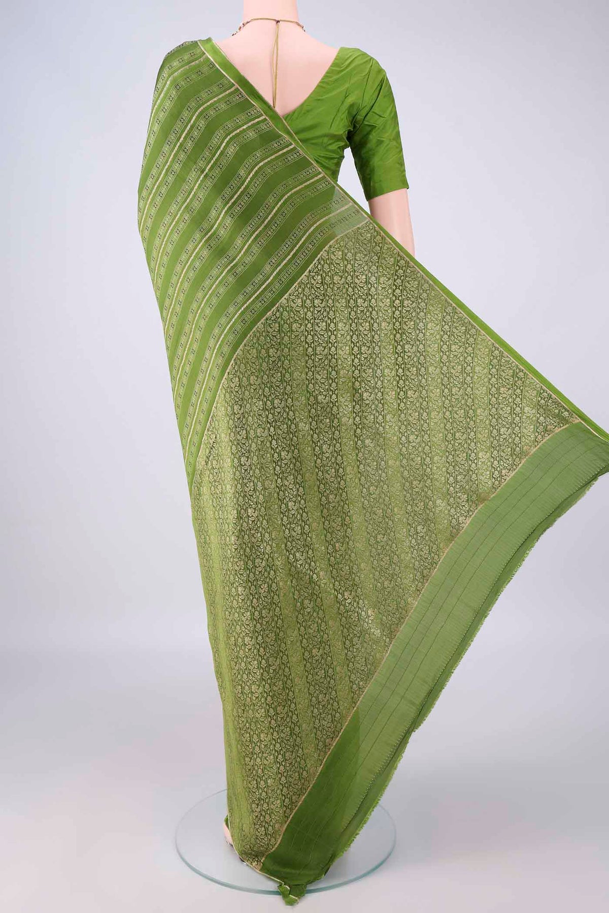 Flat view of Mehandi Green Mysore Crepe Saree with Stripes on the body and Zari Border. 