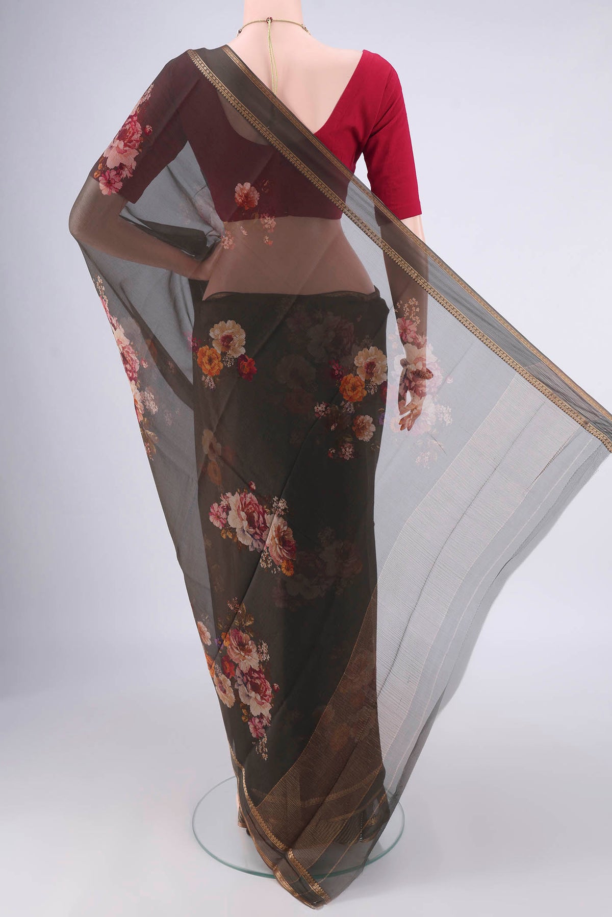 Flat view of Olive Green Mysore Chiffon Saree with Printed design on the body and Zari Border. 
