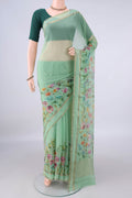 Light Green Mysore Chiffon Saree with Plain Body and Zari Border.  displayed on a mannequin
