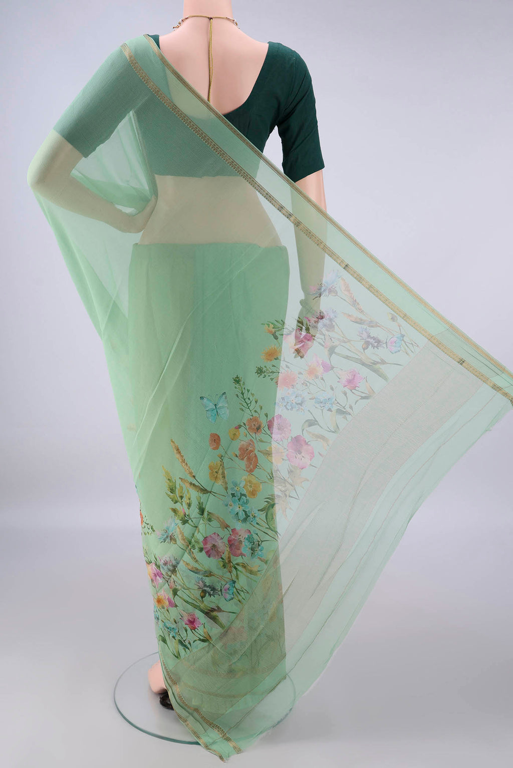 Flat view of Light Green Mysore Chiffon Saree with Plain Body and Zari Border. 
