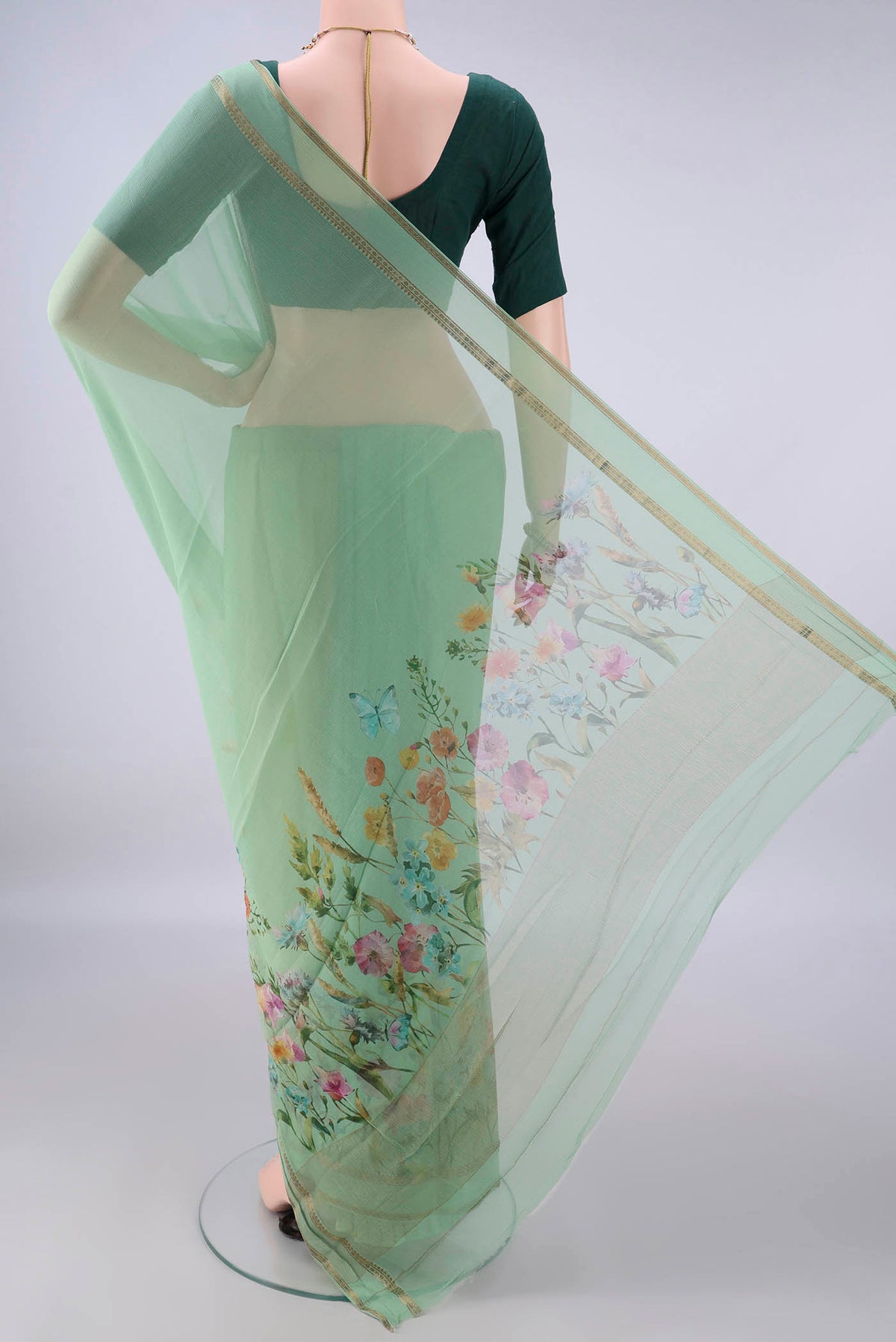 Flat view of Light Green Mysore Chiffon Saree with Plain Body and Zari Border. 