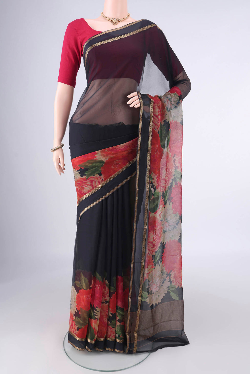 Black Mysore Chiffon Saree with Plain Body and Zari Border.  displayed on a mannequin