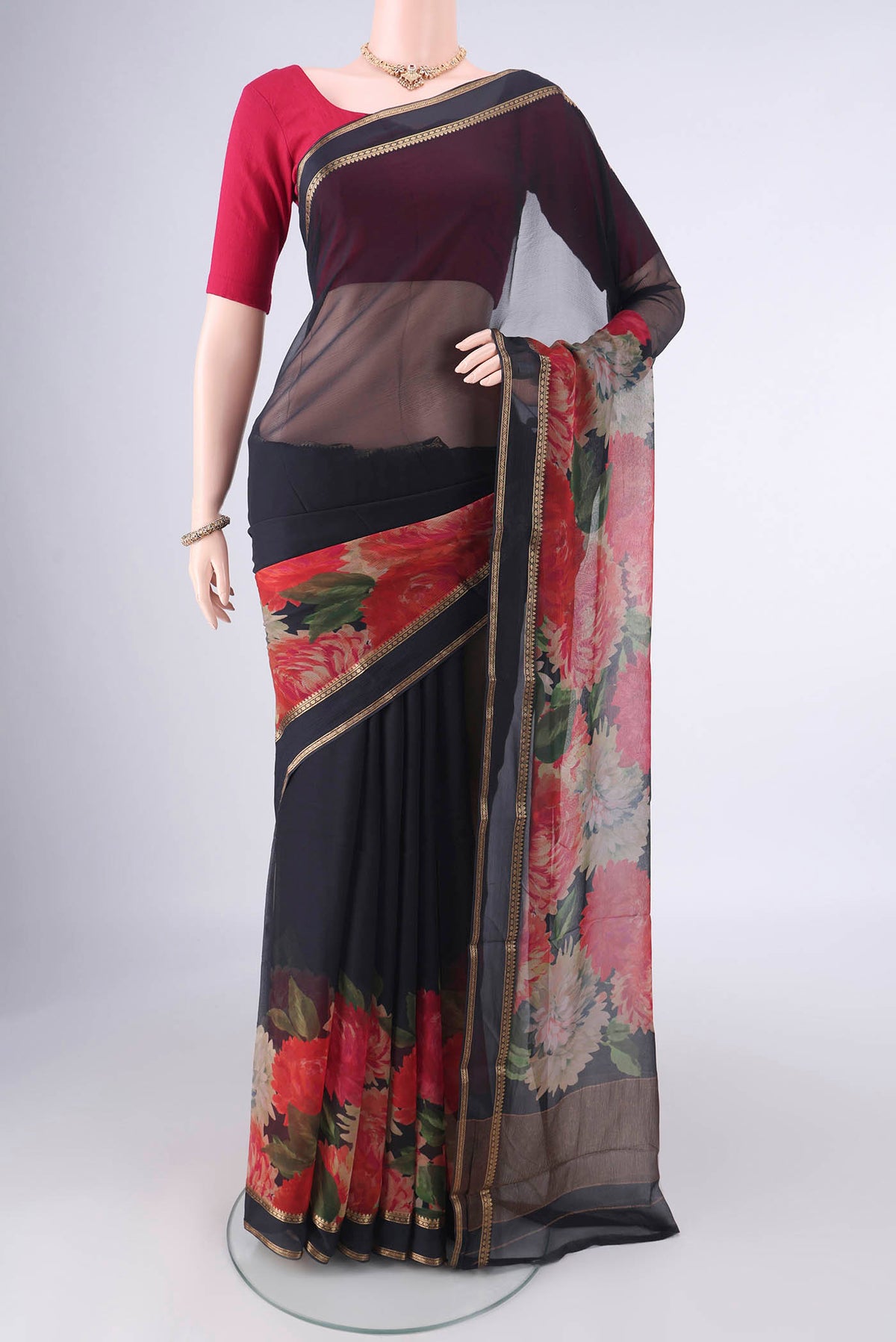 Black Mysore Chiffon Saree with Plain Body and Zari Border.  displayed on a mannequin