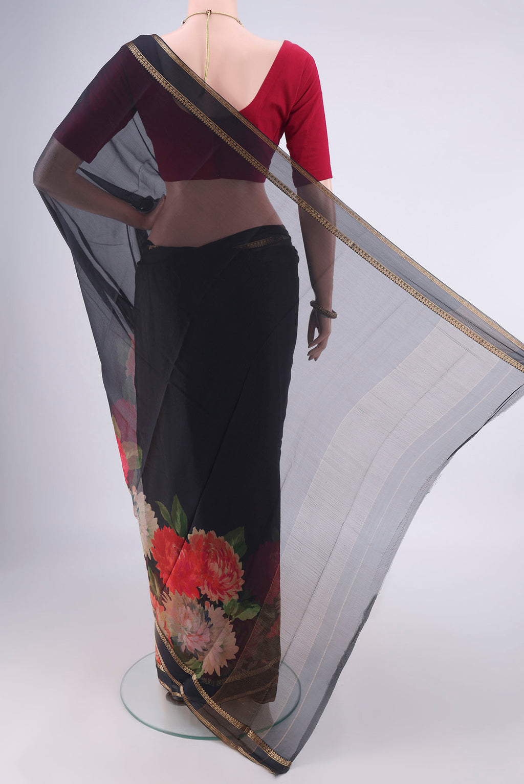 Flat view of Black Mysore Chiffon Saree with Plain Body and Zari Border. 