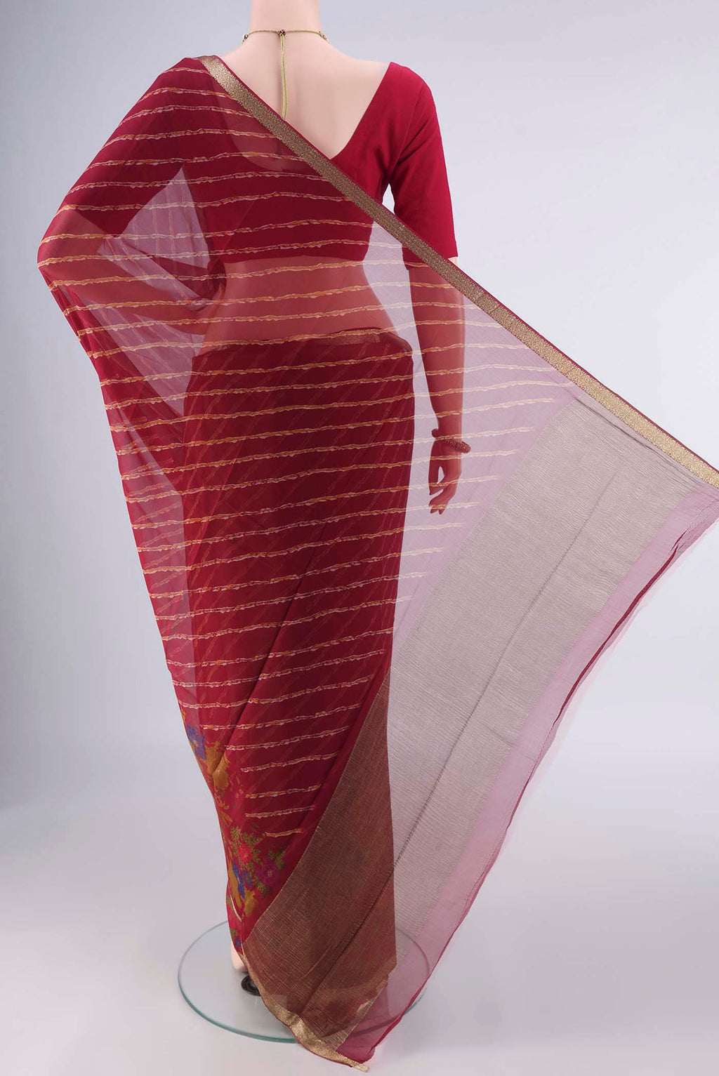 Flat view of Red Mysore Chiffon Saree with Lehariya on the body and Zari Border. 