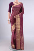 Pure Silk Magenta Soft Saree with Zari Brocade on the body and Zari Border.  displayed on a mannequin
