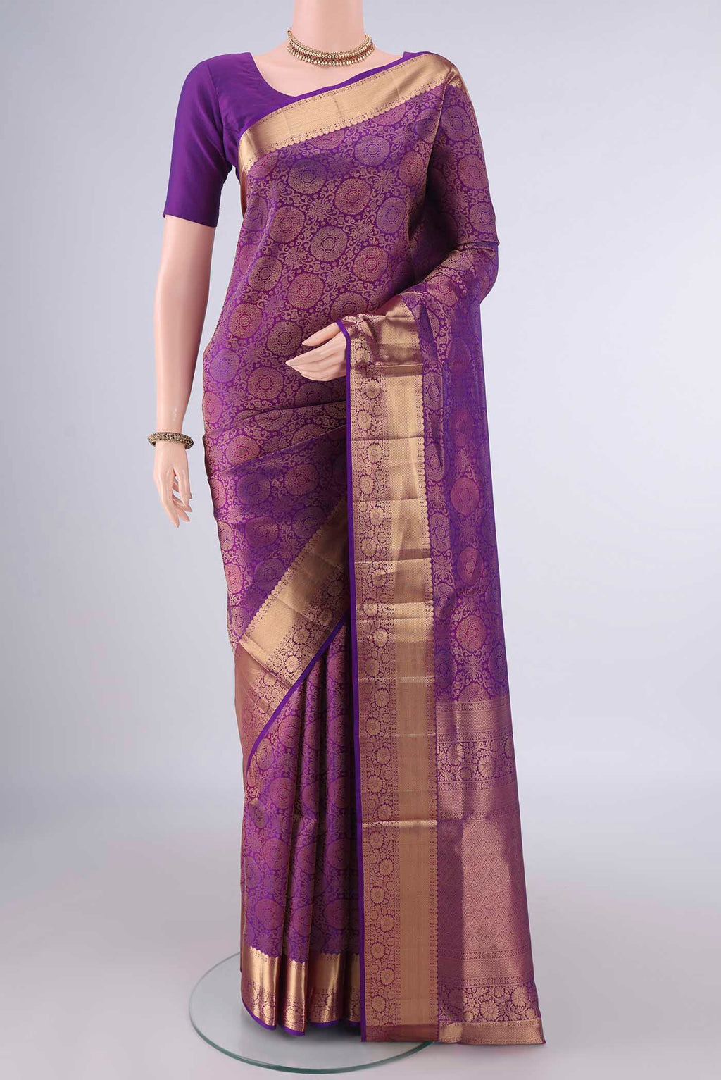Pure Silk Purple Soft Saree with Zari Brocade on the body and Zari Border.  displayed on a mannequin