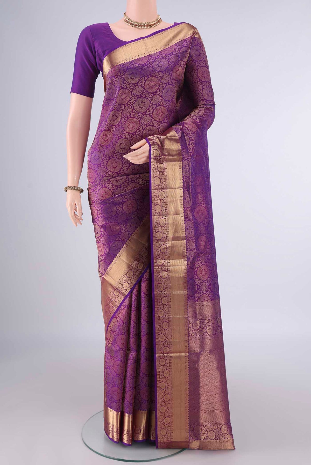 Pure Silk Purple Soft Saree with Zari Brocade on the body and Zari Border.  displayed on a mannequin