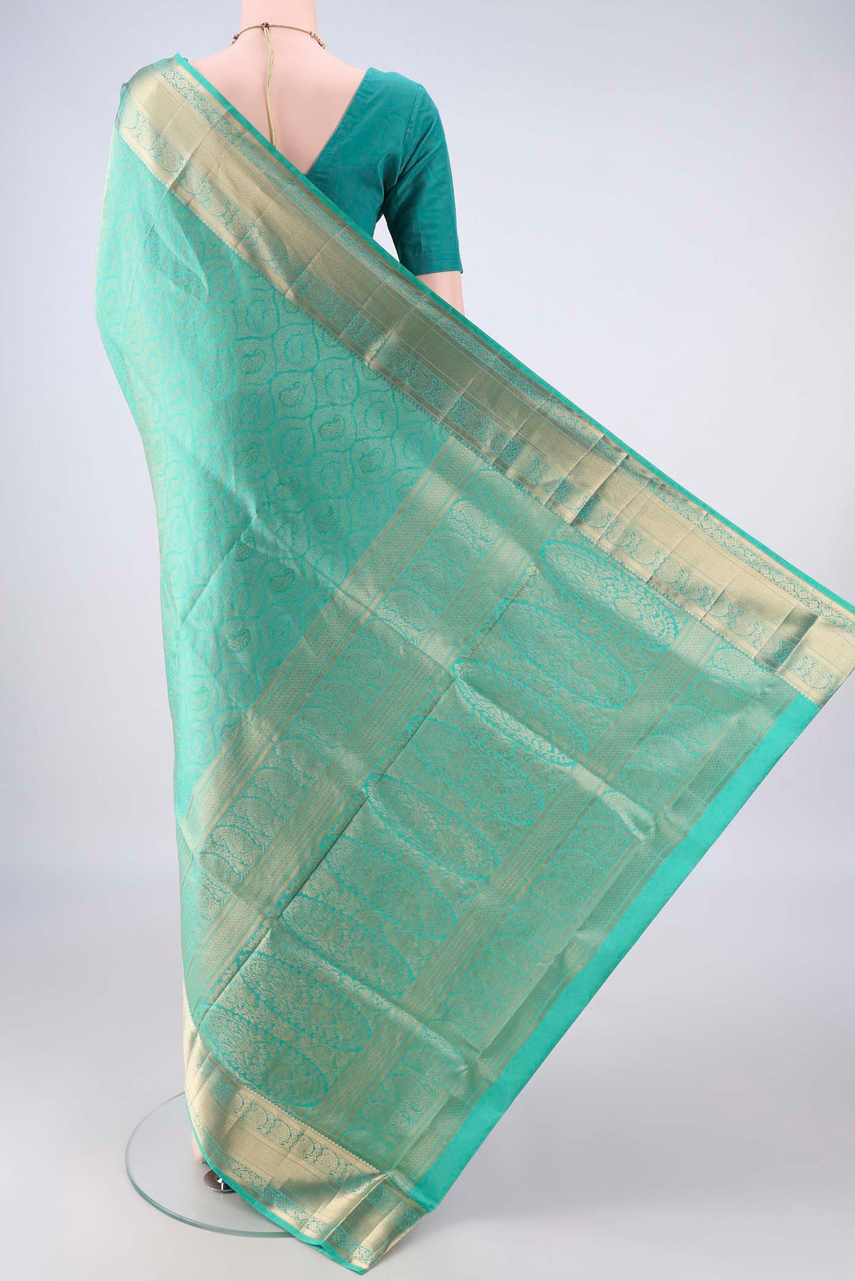 Flat view of Pure Silk Sea Green Soft Saree with Zari Brocade on the body and Zari Border. 