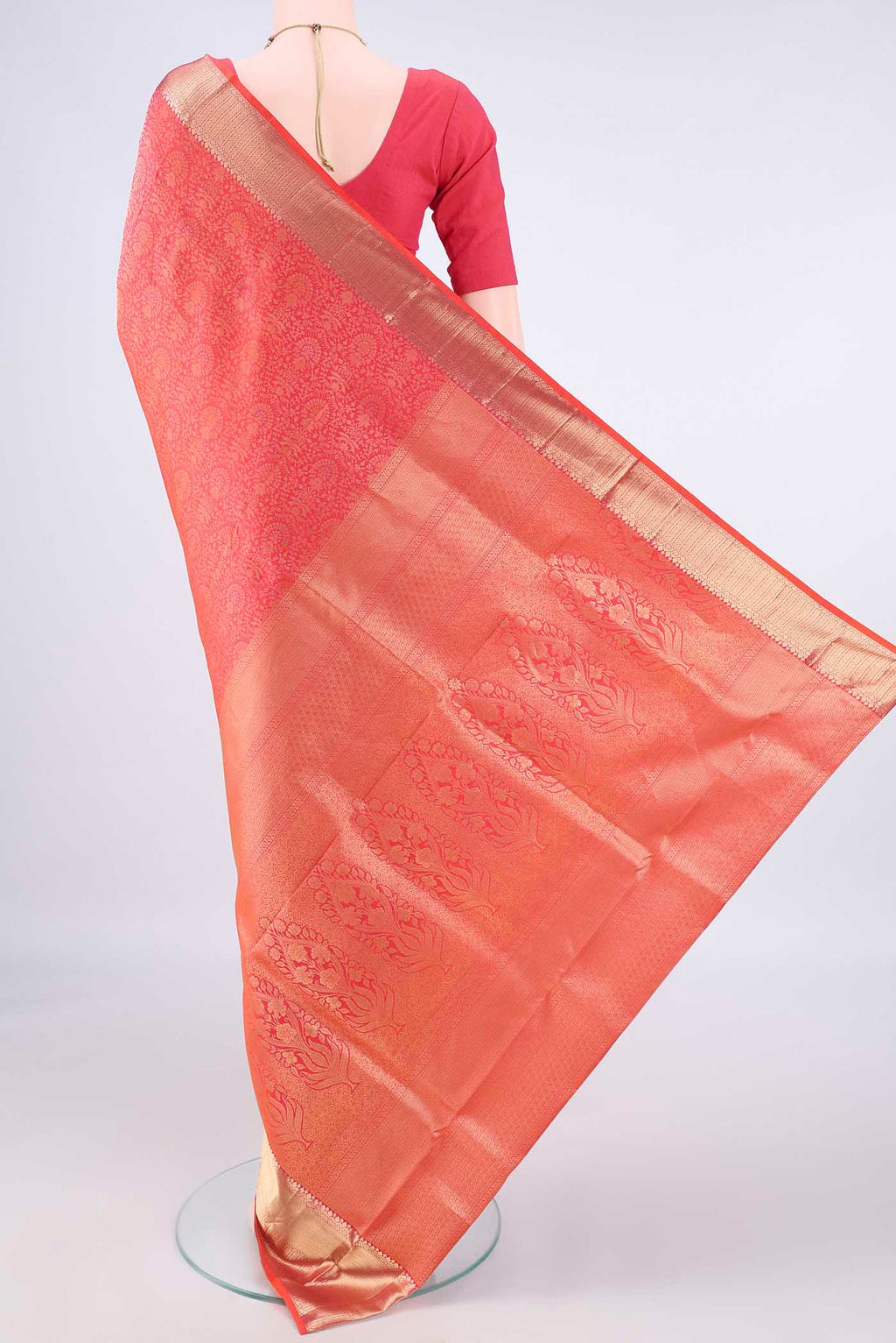 Flat view of Pure Silk Brick Orange Soft Saree with Zari Brocade on the body and Zari Border. 