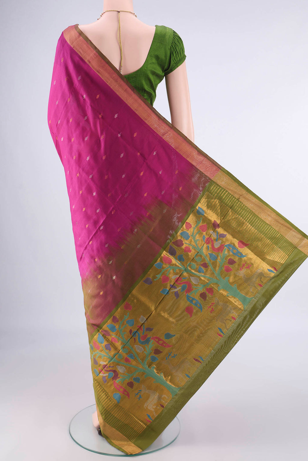 Flat view of Pure Silk Dark Pink Uppada Saree with Zari Butta on the body and Zari Border. 