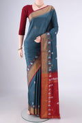Pure Silk Davys Grey Uppada Saree with Zari Butta on the body and Zari Border.  displayed on a mannequin