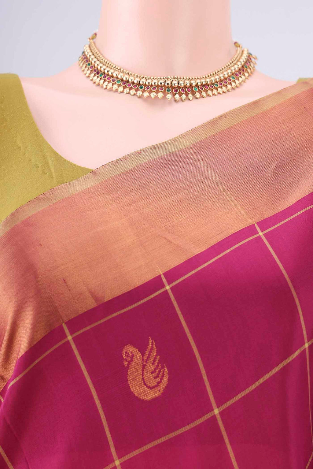 Border image of Pure Silk Dark Pink Uppada Saree with Checked design on the body and Zari Border. 