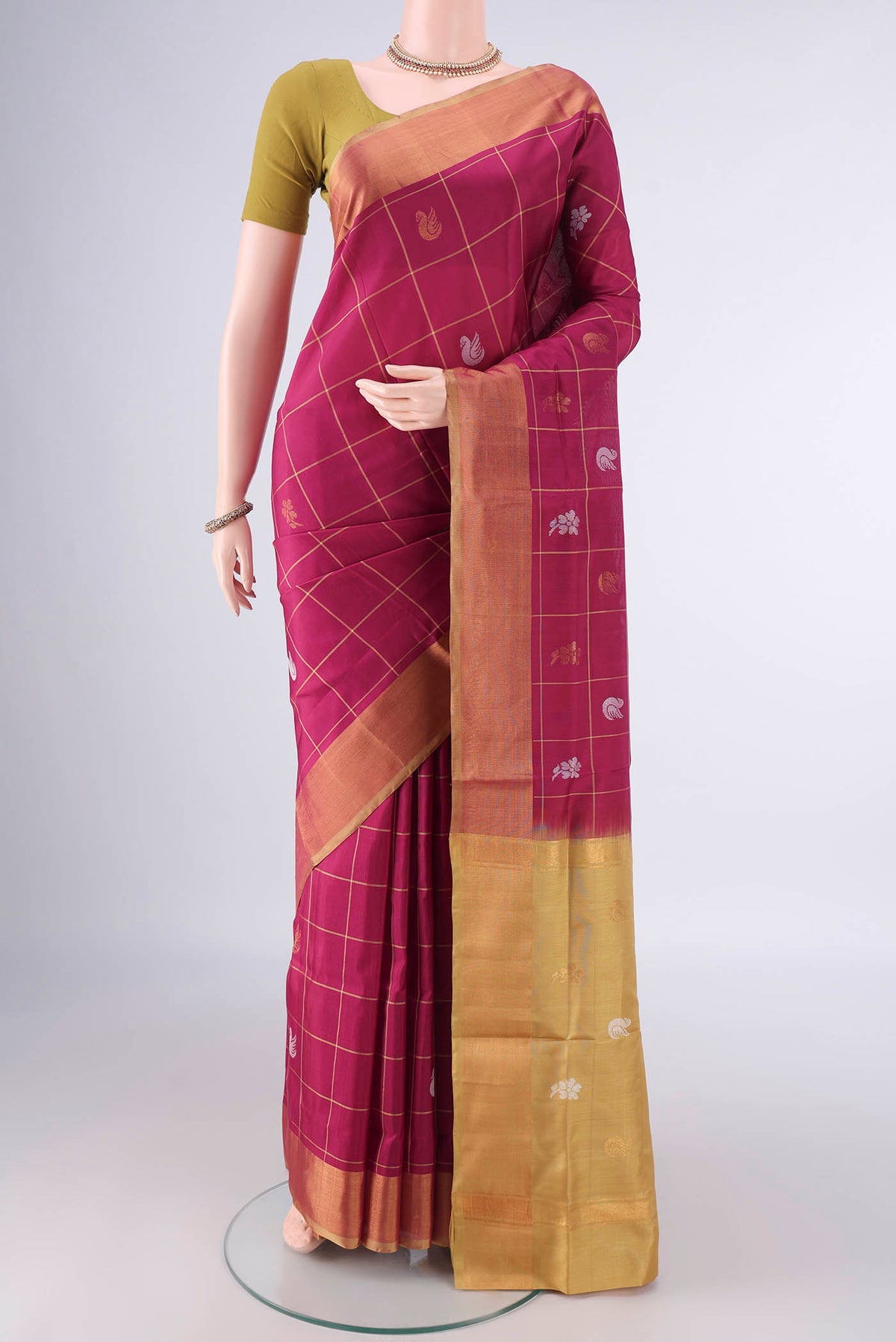 Pure Silk Dark Pink Uppada Saree with Checked design on the body and Zari Border.  displayed on a mannequin