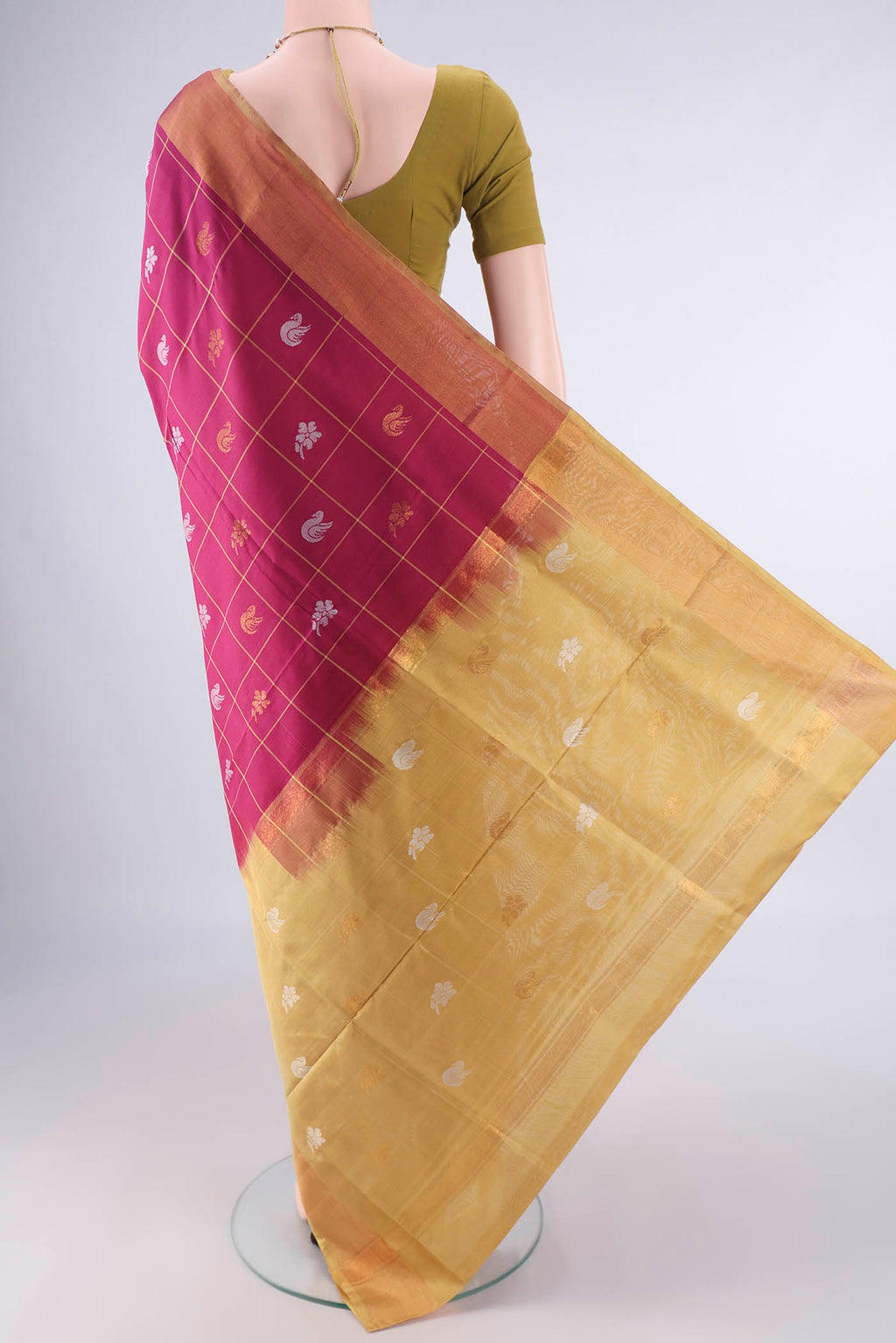 Flat view of Pure Silk Dark Pink Uppada Saree with Checked design on the body and Zari Border. 