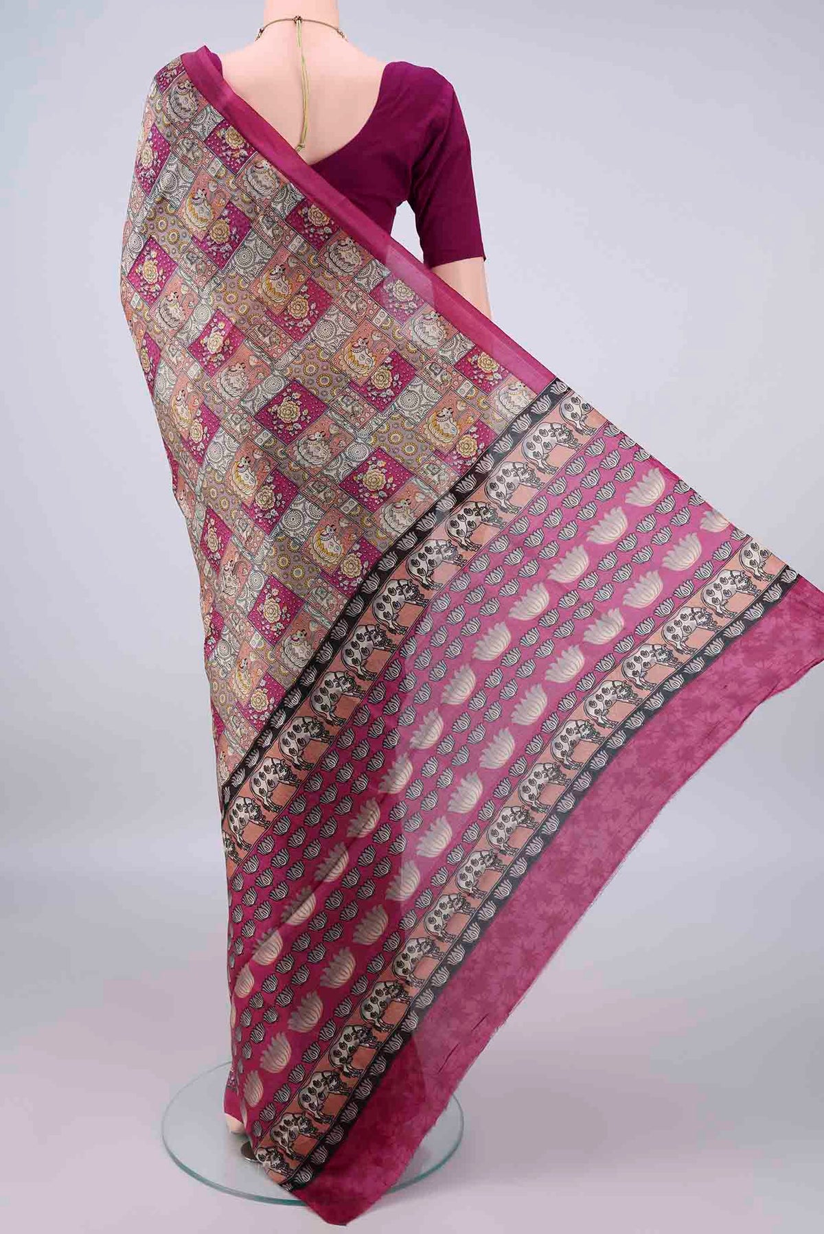 Flat view of Pure Silk Grey Printed Saree with Printed design on the body and Printed Border. 