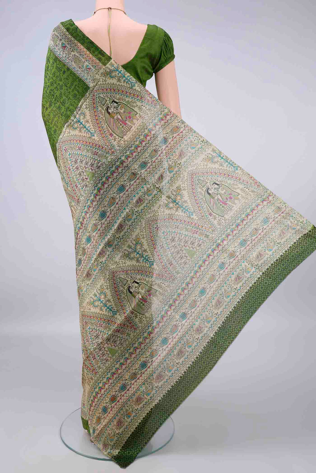 Flat view of Pure Silk Green Printed Saree with Printed design on the body and Printed Border. 
