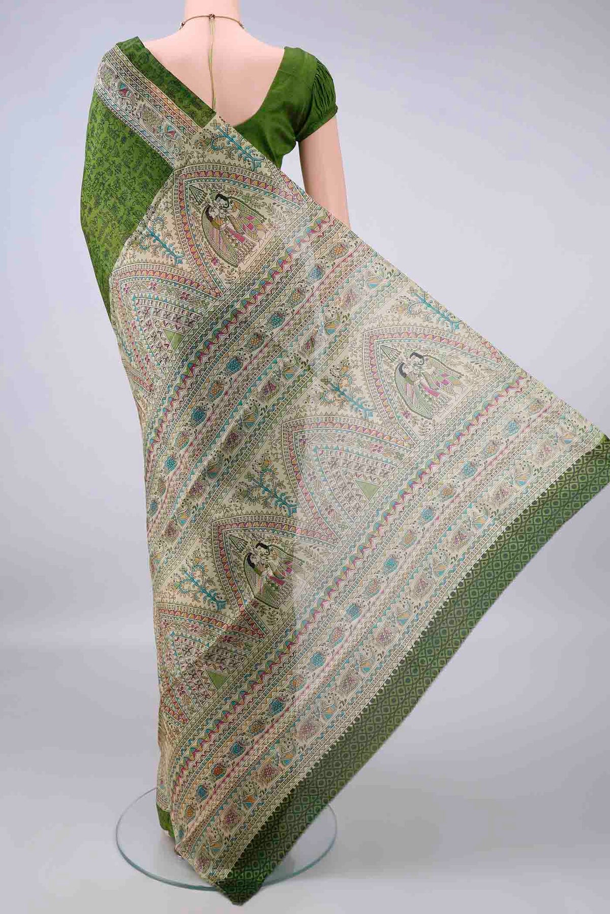 Flat view of Pure Silk Green Printed Saree with Printed design on the body and Printed Border. 