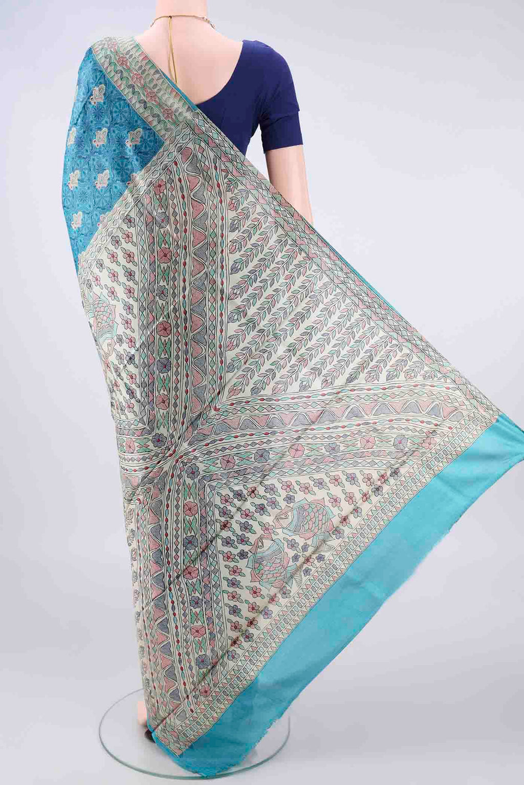 Flat view of Blue Tussar Saree with Printed design on the body and Printed Border. 