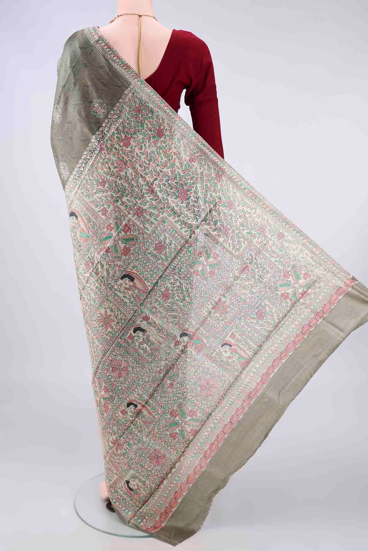 Flat view of Sage Green Tussar Saree with Printed design on the body and Without Border. 