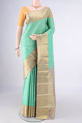 Pure Silk Acid Green Kanjivaram Saree with Checked design on the body and Zari Border.  displayed on a mannequin
