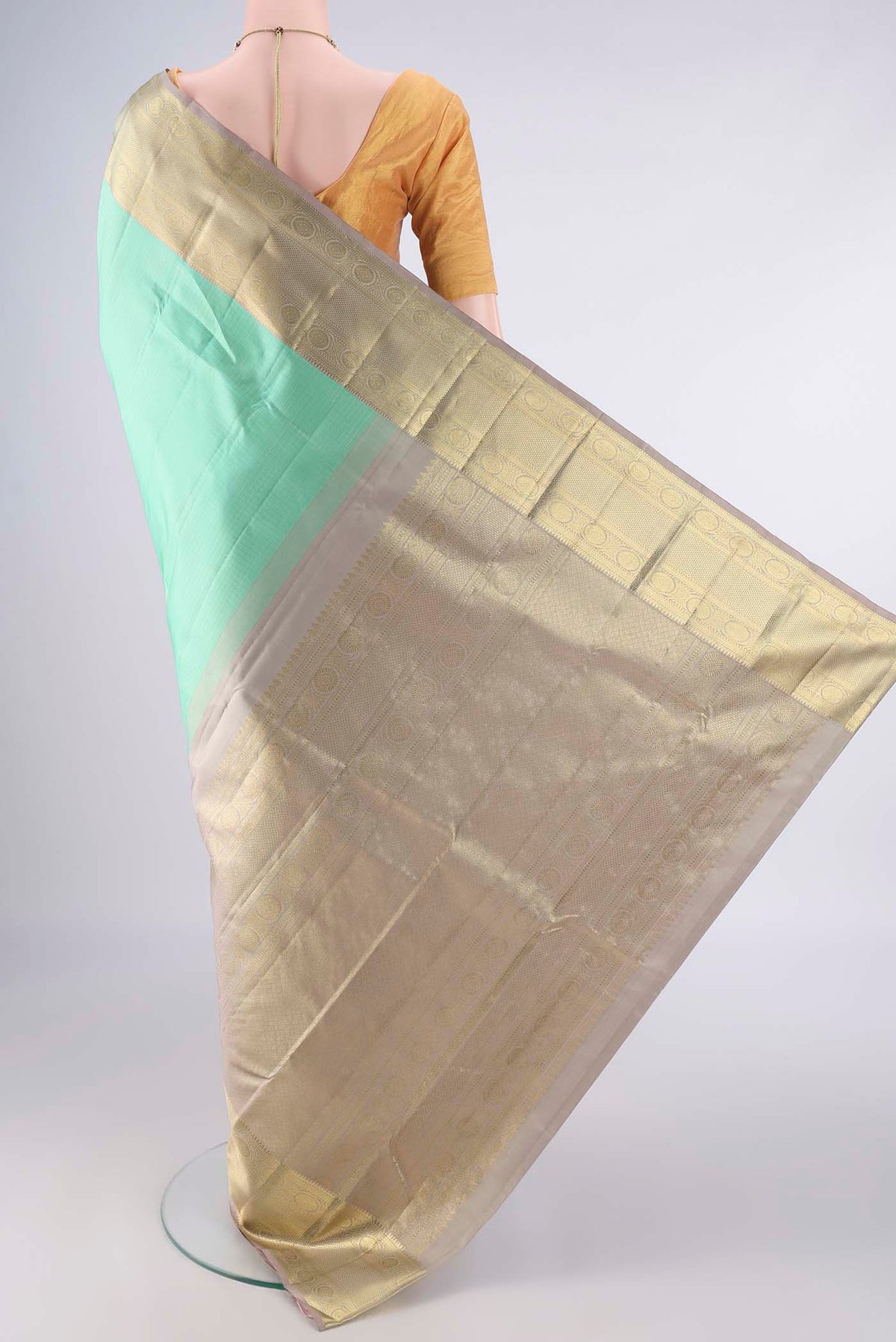Flat view of Pure Silk Acid Green Kanjivaram Saree with Checked design on the body and Zari Border. 