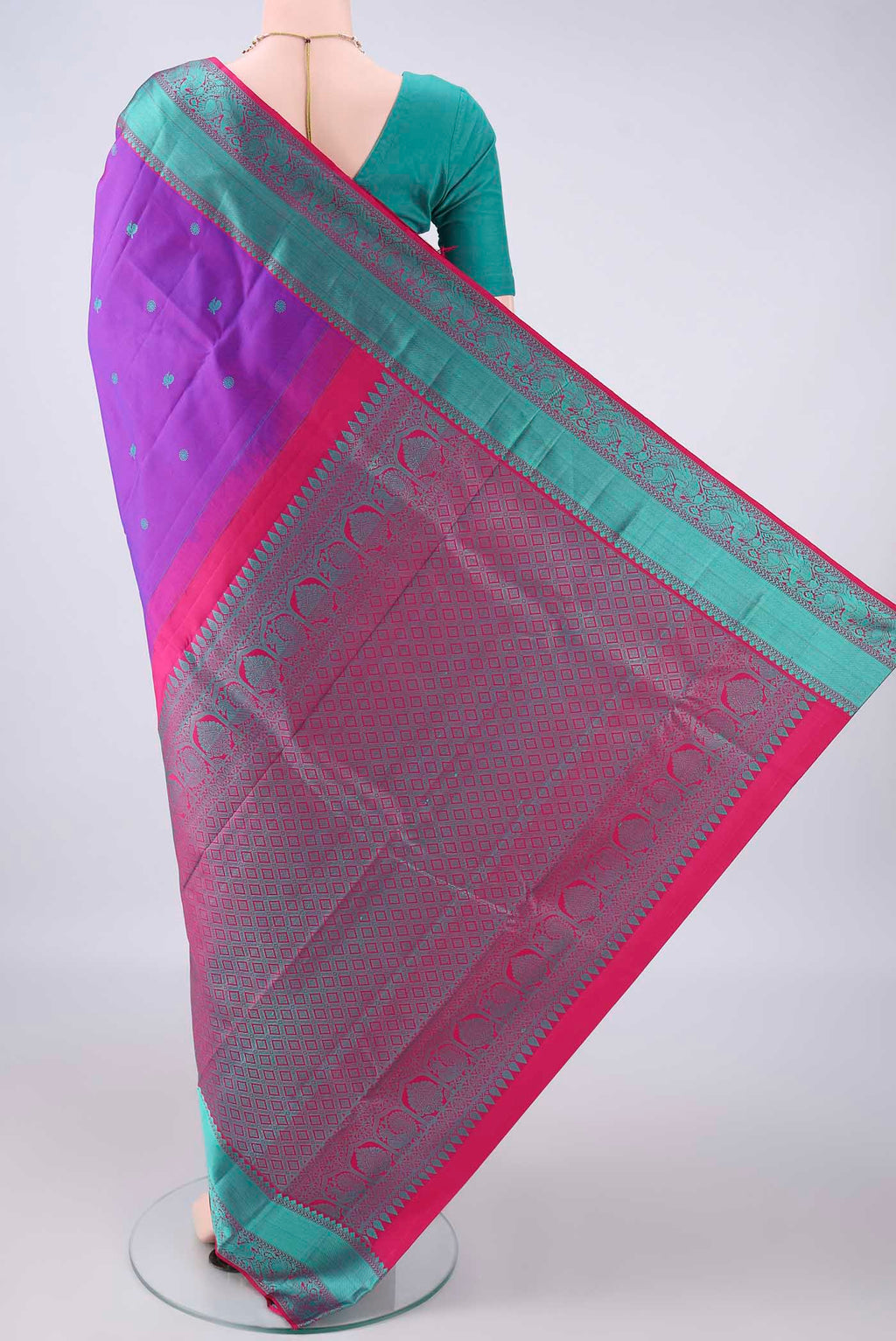 Flat view of Pure Silk Purple Kanchipuram Saree with Thread Butta on the body and Thread Border. 