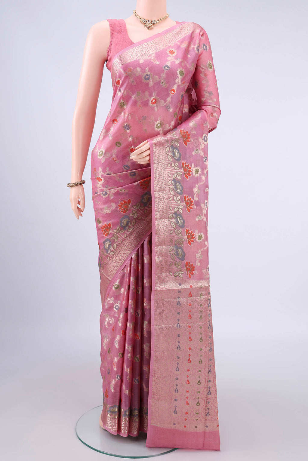 Pink Banarasi Tussar Saree with Zari And Thread Butta on the body and Zari Border.  displayed on a mannequin