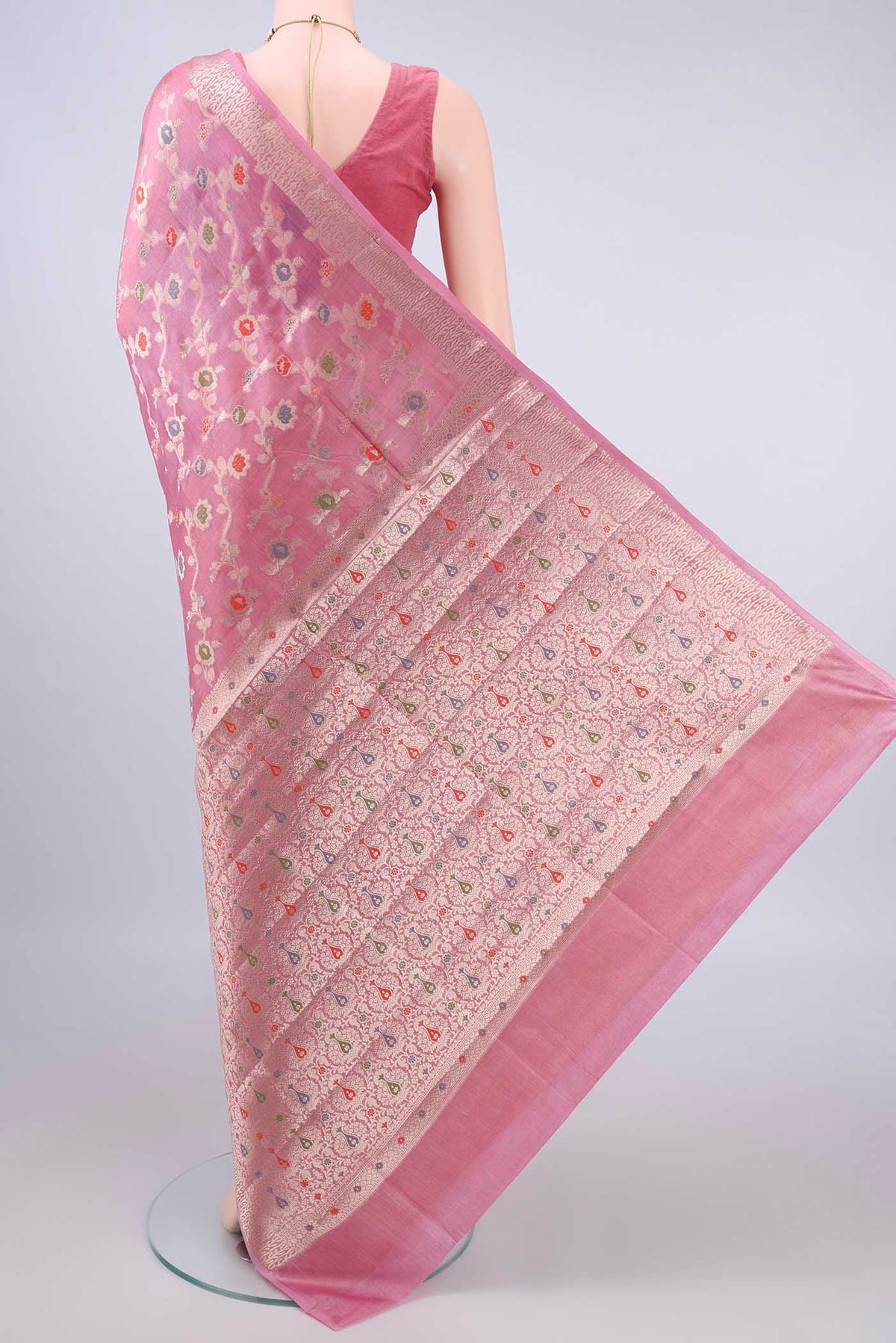 Flat view of Pink Banarasi Tussar Saree with Zari And Thread Butta on the body and Zari Border. 
