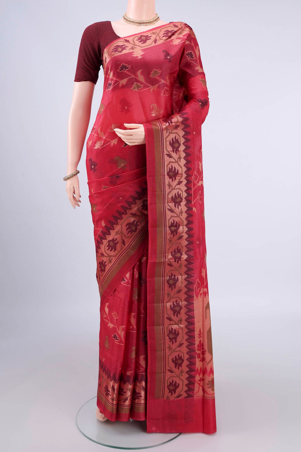 Imperial Red Banarasi Tussar Saree with Zari And Thread Butta on the body and Thread Border.  displayed on a mannequin