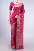 Rani Pink Banarasi Tussar Saree with Zari And Thread Butta on the body and Zari Border.  displayed on a mannequin