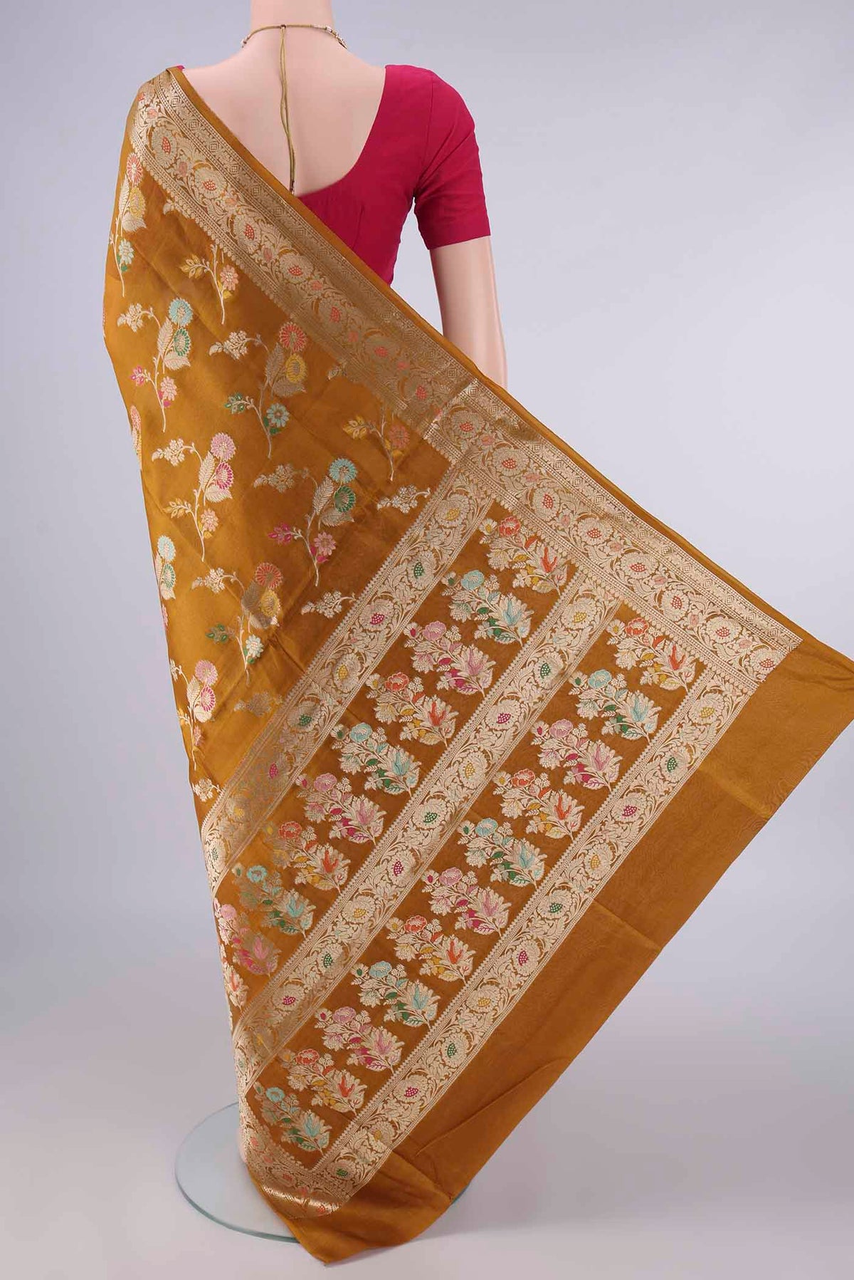 Flat view of Pure Silk Mustard Banarasi Raw Saree with Zari And Thread Butta on the body and Zari Border. 