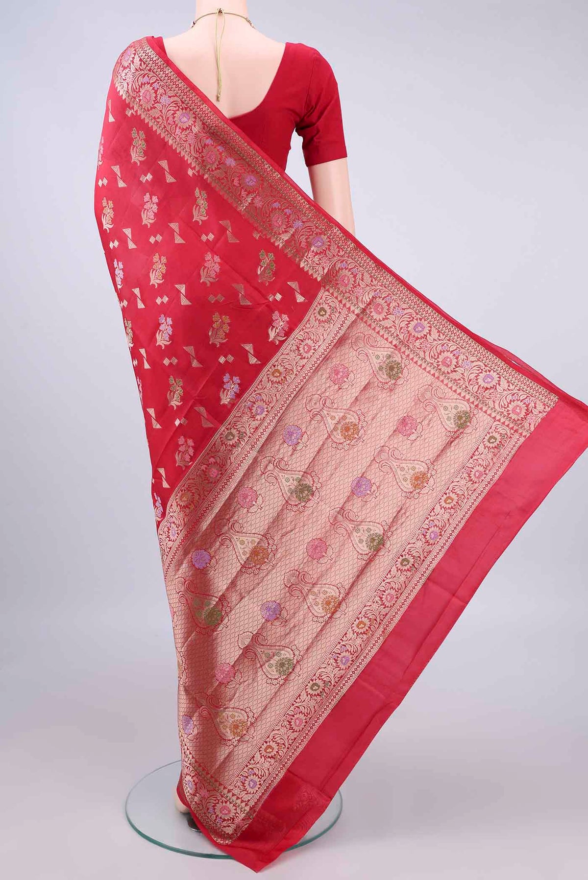 Flat view of Pure Silk Red Banarasi Raw Saree with Zari And Thread Butta on the body and Zari Border. 