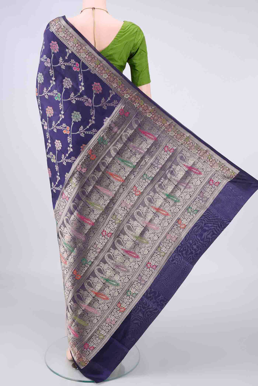 Flat view of Pure Silk Navy Blue Banarasi Raw Saree with Zari And Thread Butta on the body and Zari Border. 