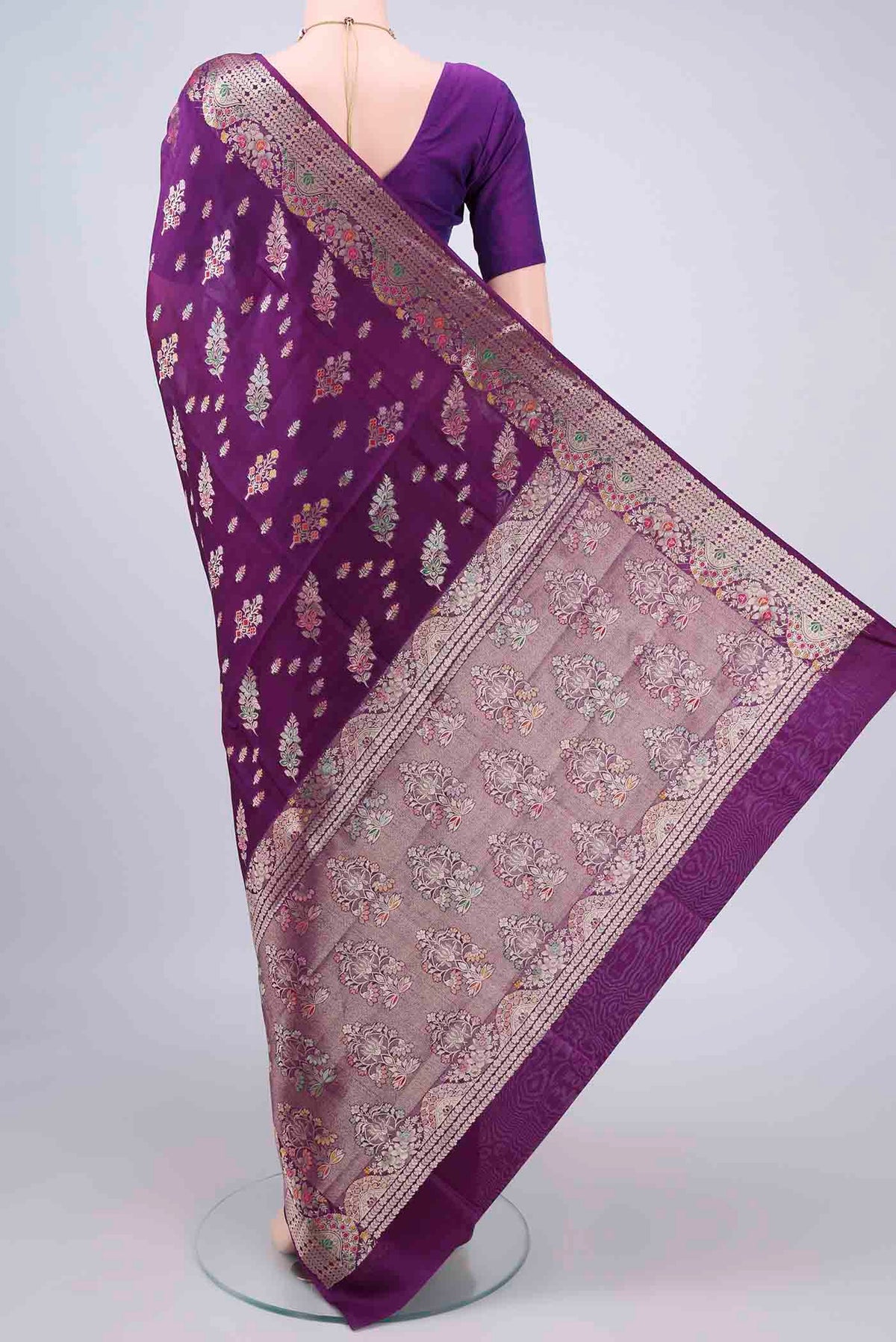Flat view of Pure Silk Purple Banarasi Raw Saree with Zari And Thread Butta on the body and Zari Border. 