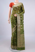 Pure Silk Mehandi Green Banarasi Raw Saree with Zari And Thread Butta on the body and Zari Border.  displayed on a mannequin