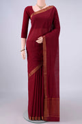Maroon Mangalagiri Cotton Saree with Plain Body and Zari Border.  displayed on a mannequin