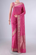 Pure Silk Pink Banarasi Katan Saree with Zari Butta on the body and Zari Border.  displayed on a mannequin