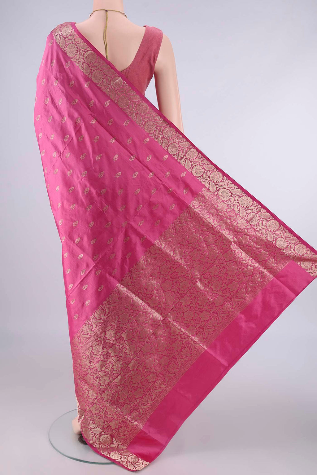 Flat view of Pure Silk Pink Banarasi Katan Saree with Zari Butta on the body and Zari Border. 