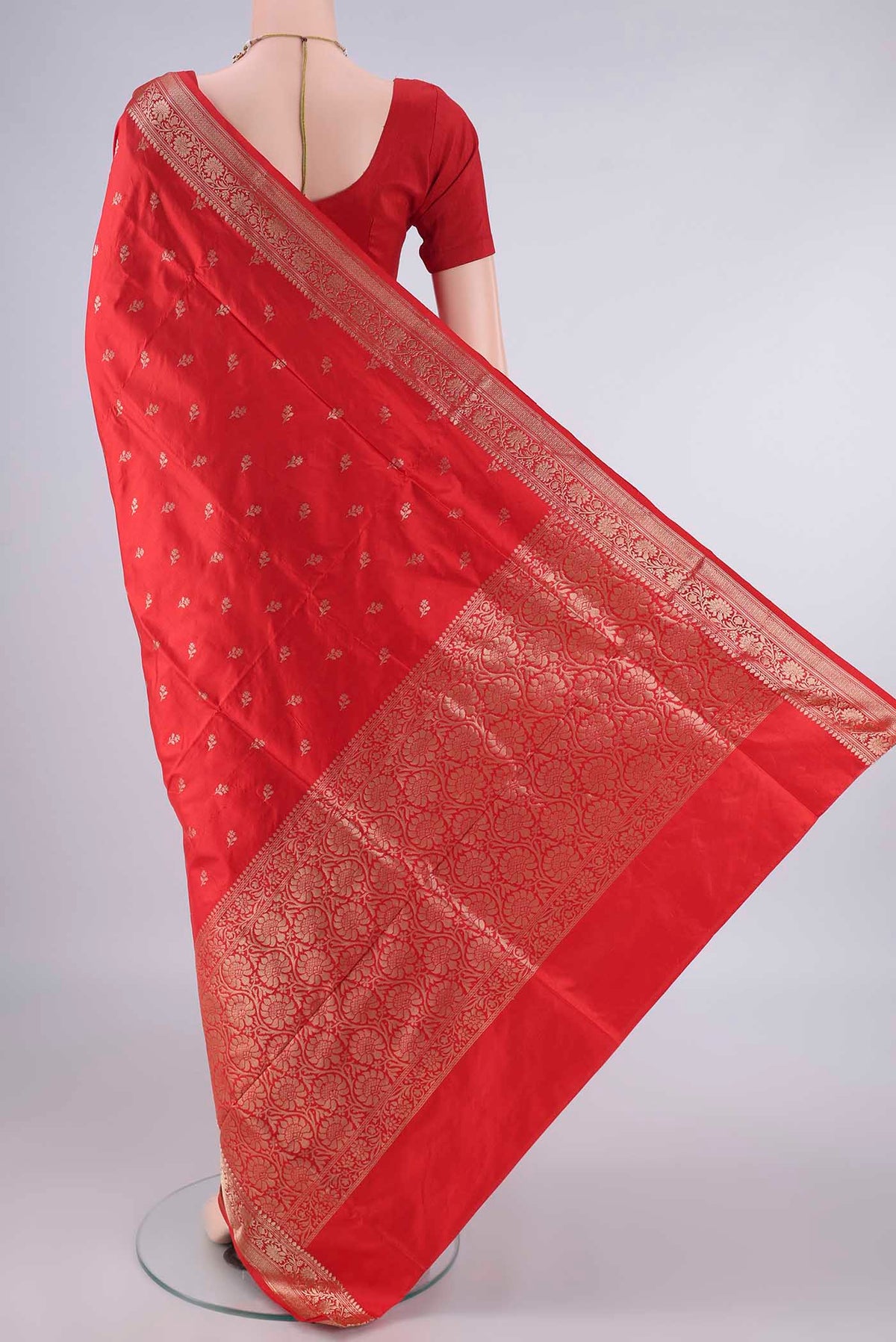 Flat view of Pure Silk Red Banarasi Katan Saree with Zari Butta on the body and Zari Border. 