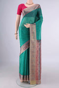 Green Banarasi Tussar Saree with Plain Body and Zari Border.  displayed on a mannequin