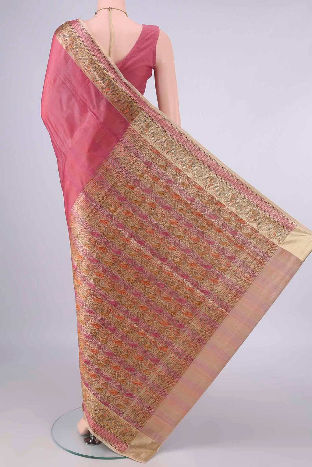 Flat view of Peach Banarasi Tussar Saree with Plain Body and Zari Border. 