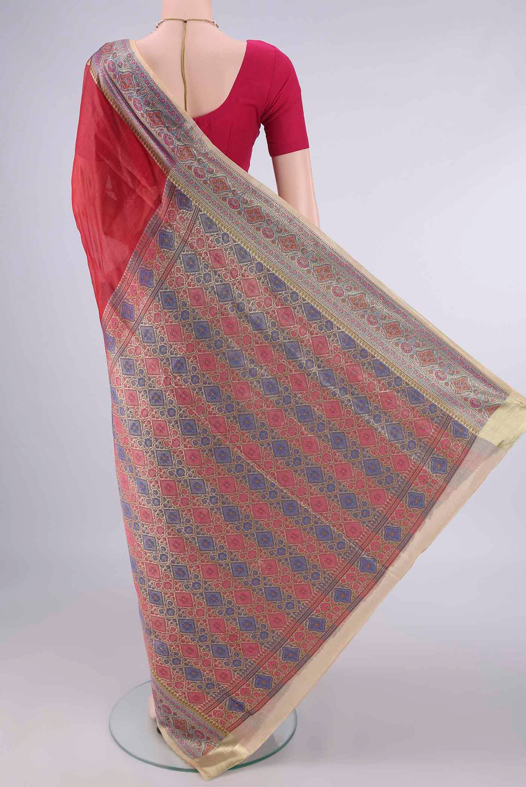 Flat view of Red Banarasi Tussar Saree with Plain Body and Zari Border. 
