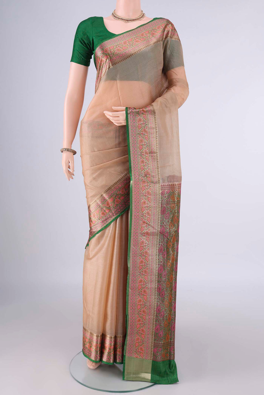 Dark Beige Banarasi Tussar Saree with Plain Body and Zari Border.  displayed on a mannequin