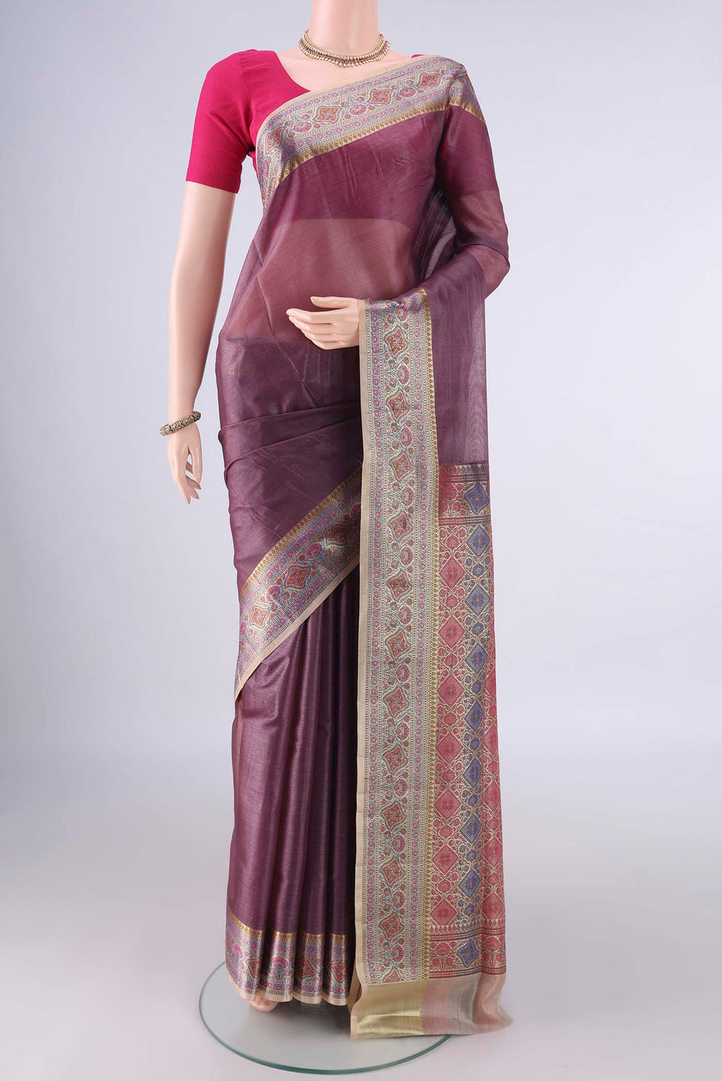 Mauve Banarasi Tussar Saree with Plain Body and Zari Border.  displayed on a mannequin