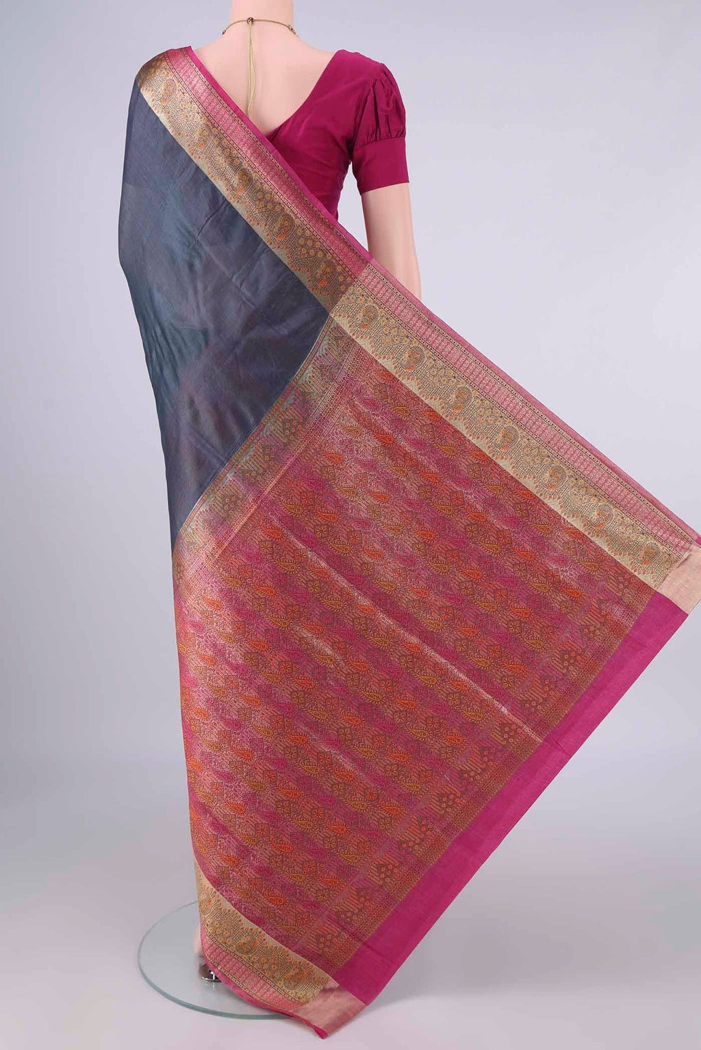 Flat view of Davys Grey Banarasi Tussar Saree with Plain Body and Zari Border. 
