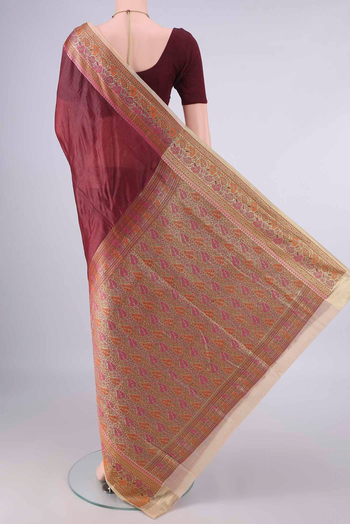 Flat view of Brown Banarasi Tussar Saree with Plain Body and Zari Border. 