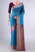 Blue Banarasi Tussar Saree with Plain Body and Zari Border.  displayed on a mannequin
